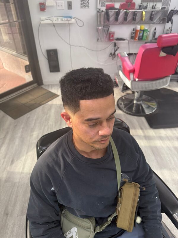 Overhead view of a short boxy crop with a sharp fade and crisp lineup